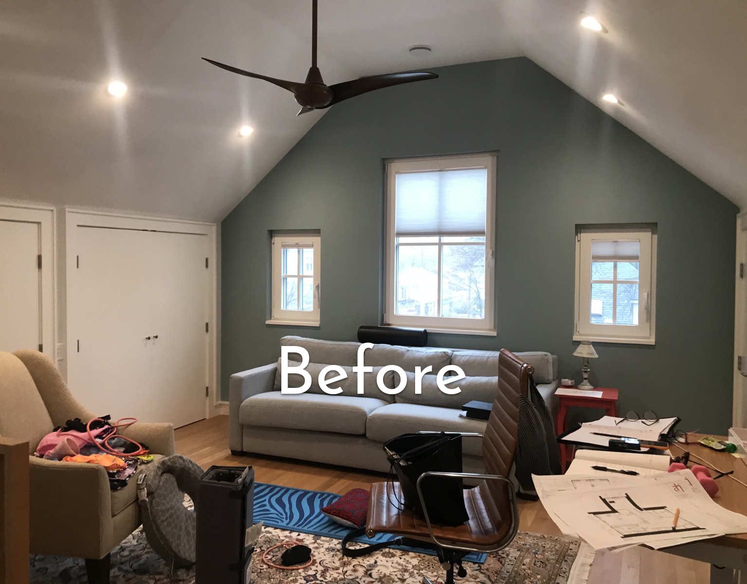 A living room filled with furniture and a window