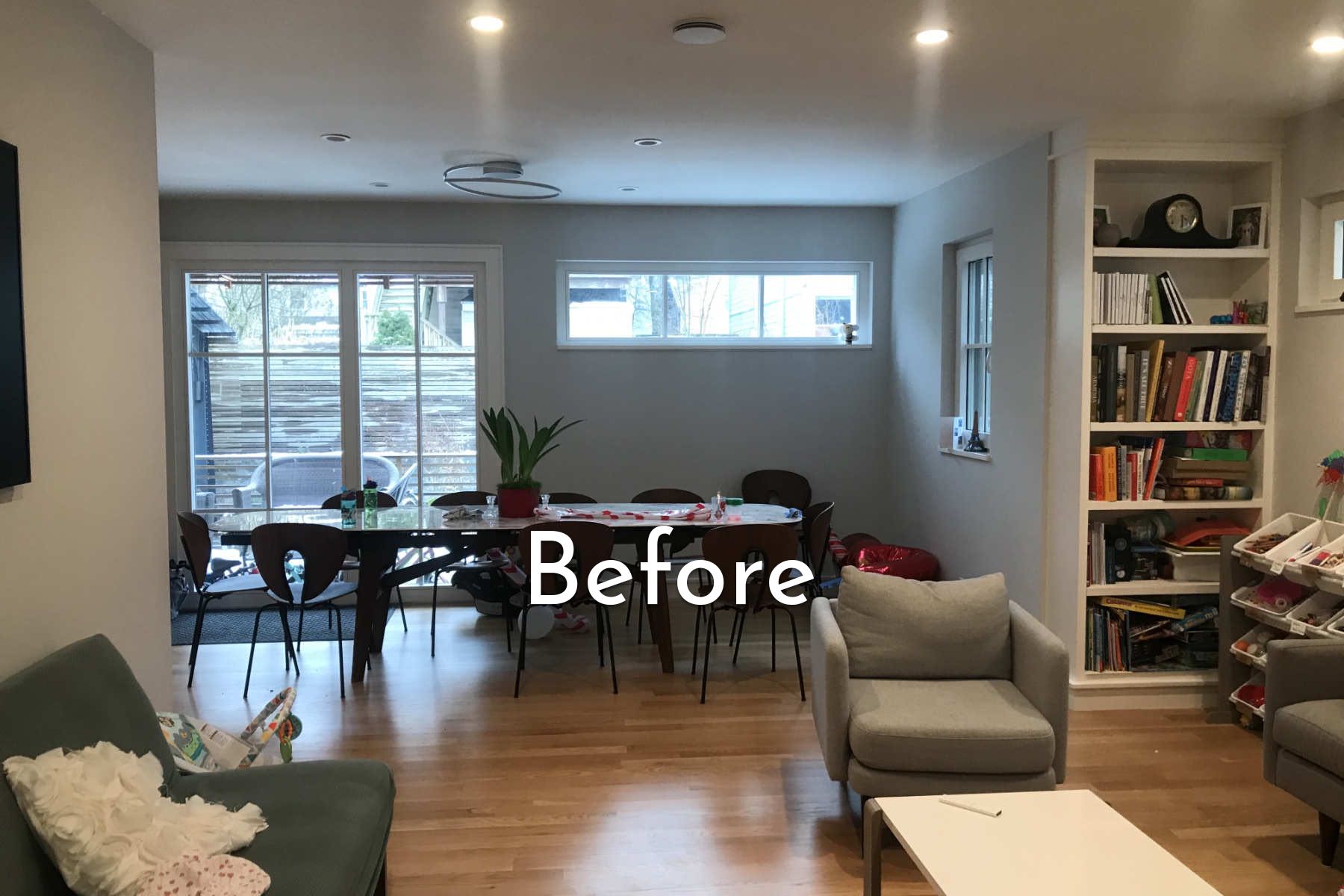 A living room filled with furniture and a window